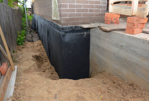 Happy homeowners after waterproofing job in Oradell